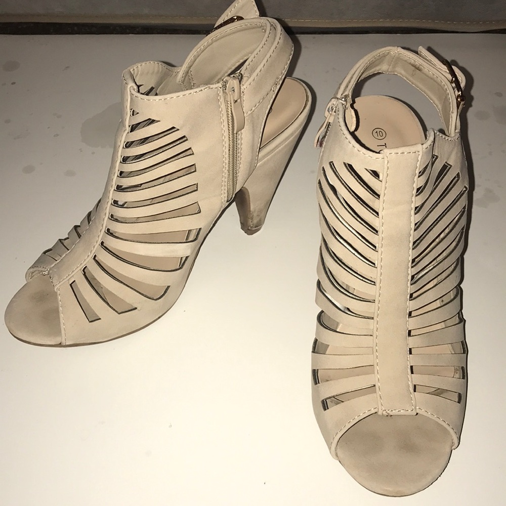 Caged high heel with open toe and side zipper!